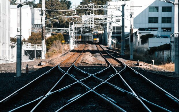 train tracks in the city during daytime