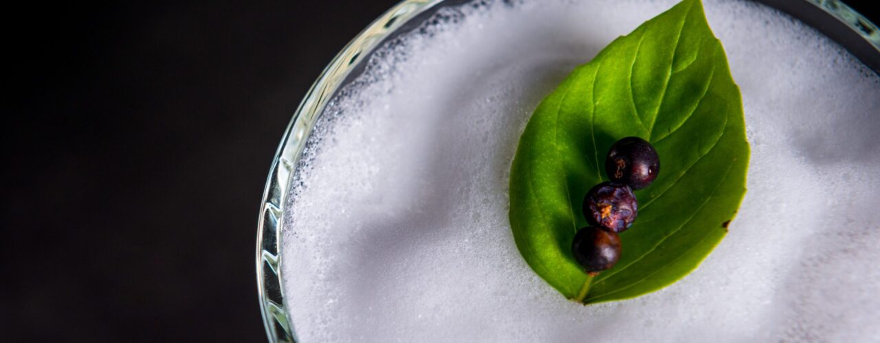 green sliced fruit on clear glass bowl