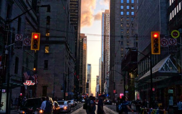 photography of people walking near street during daytime