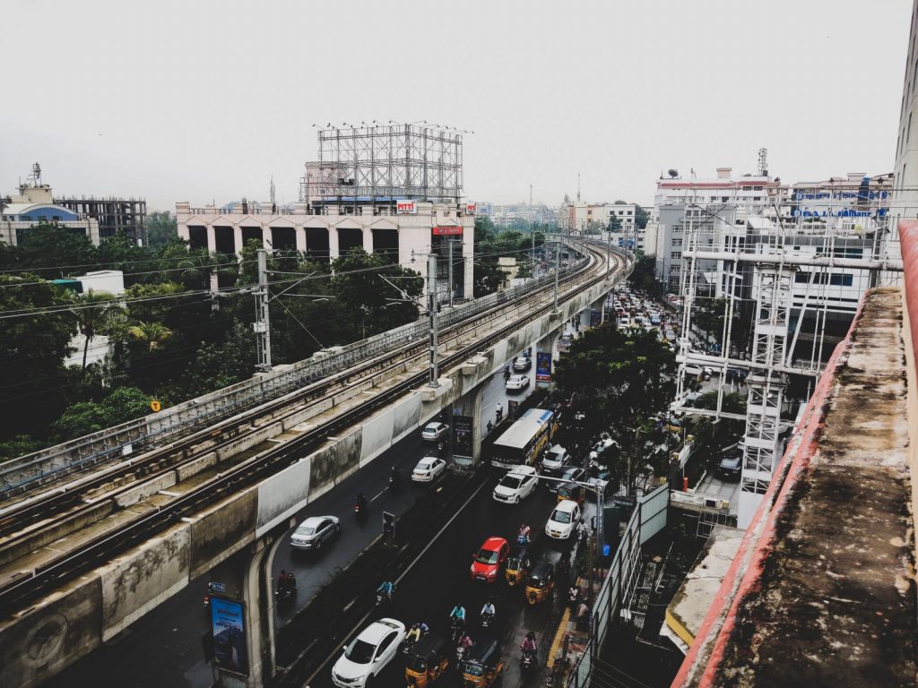 high-angle photography of concrete train railway