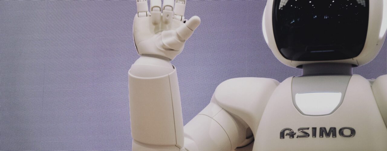 Asimo robot doing handsign