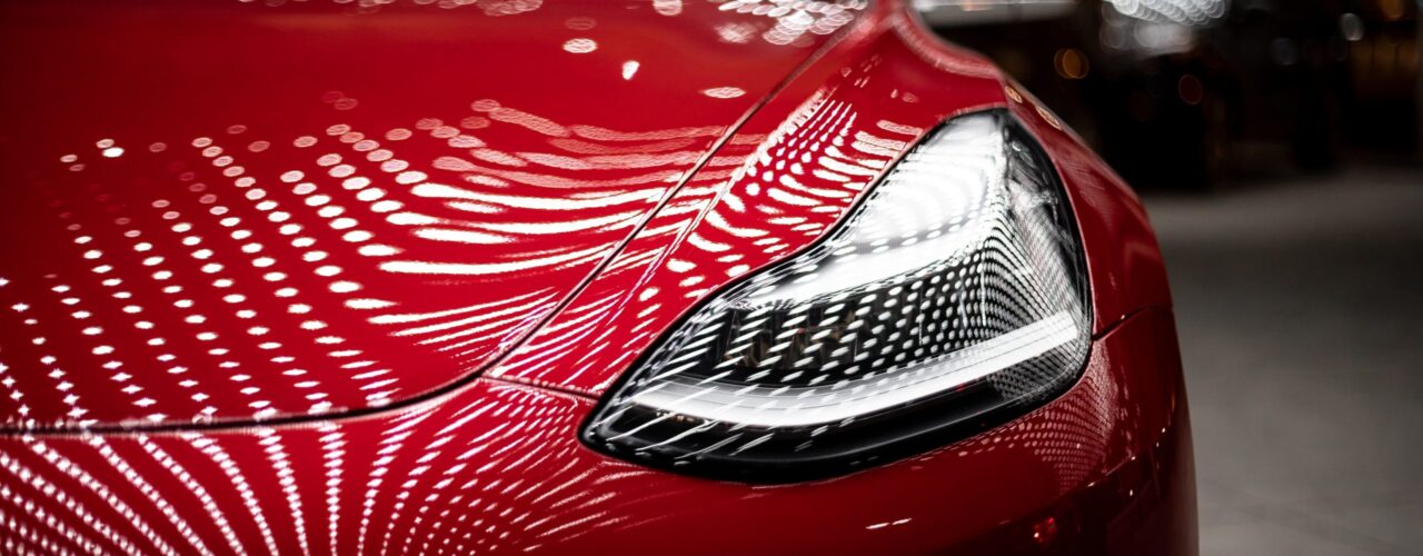 close-up photography of red car