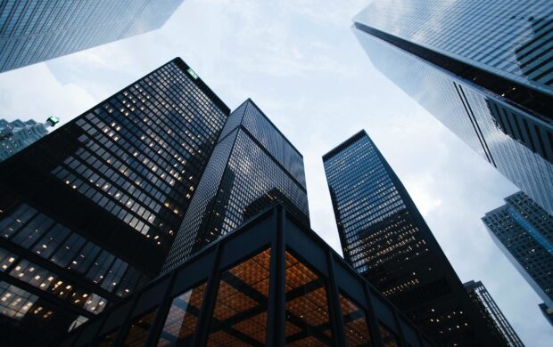 low angle photo of city high rise buildings during daytime