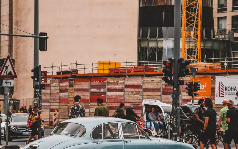cars on road near buildings during daytime