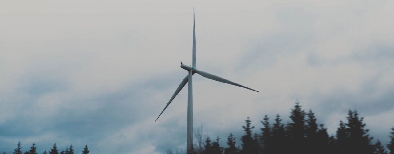 white windmill during cloudy sky