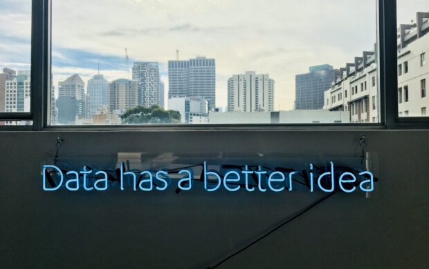 white building with data has a better idea text signage