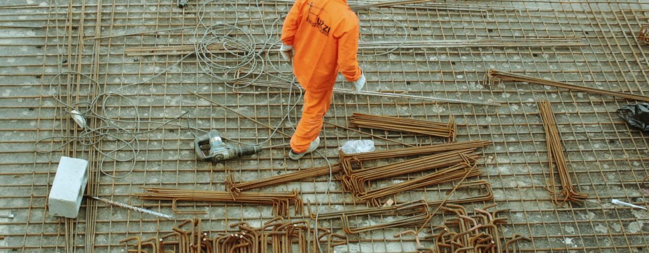 man walking on construction site