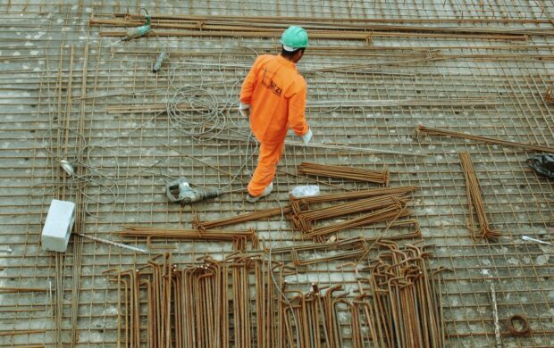 man walking on construction site