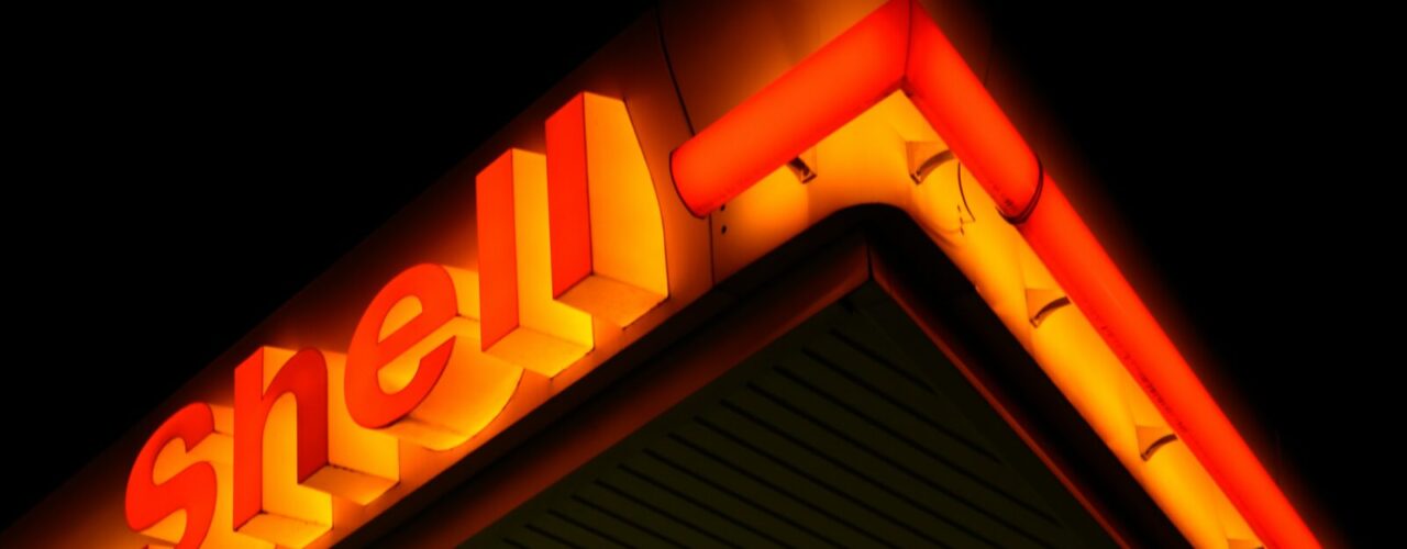 low angle photography of Shell gas station at night