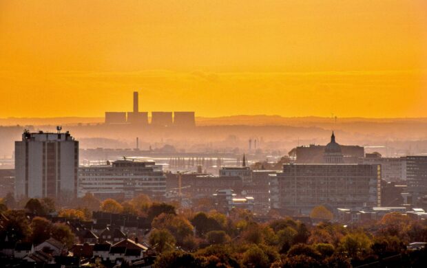 city skyline during orange sunset