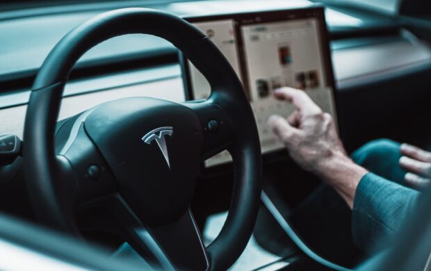 black Tesla steering wheel