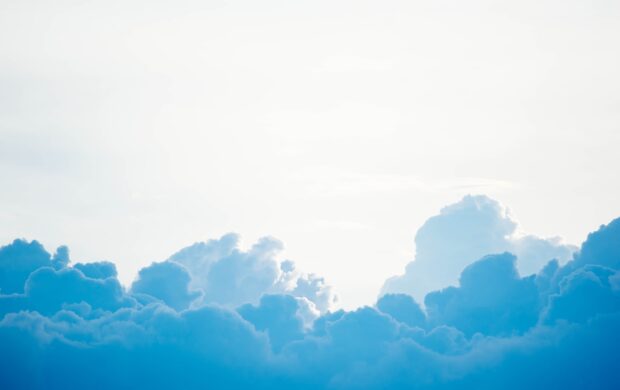 blue clouds under white sky