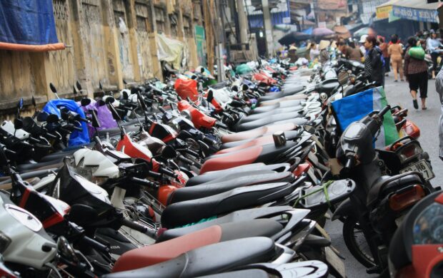 parked motorcycle on the street during daytime