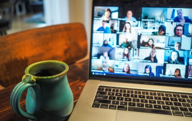 macbook pro displaying group of people