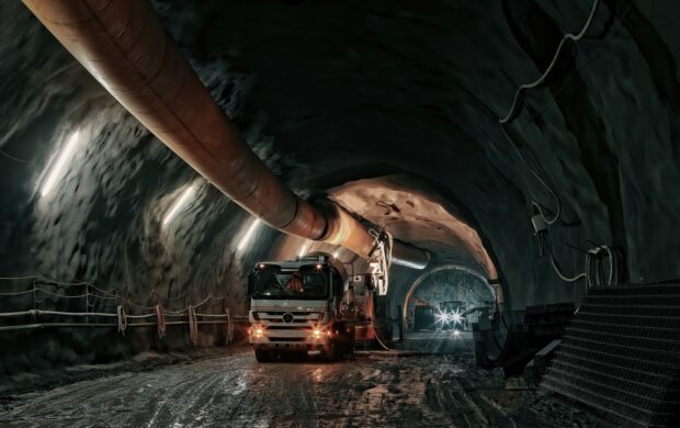 red and black truck in tunnel