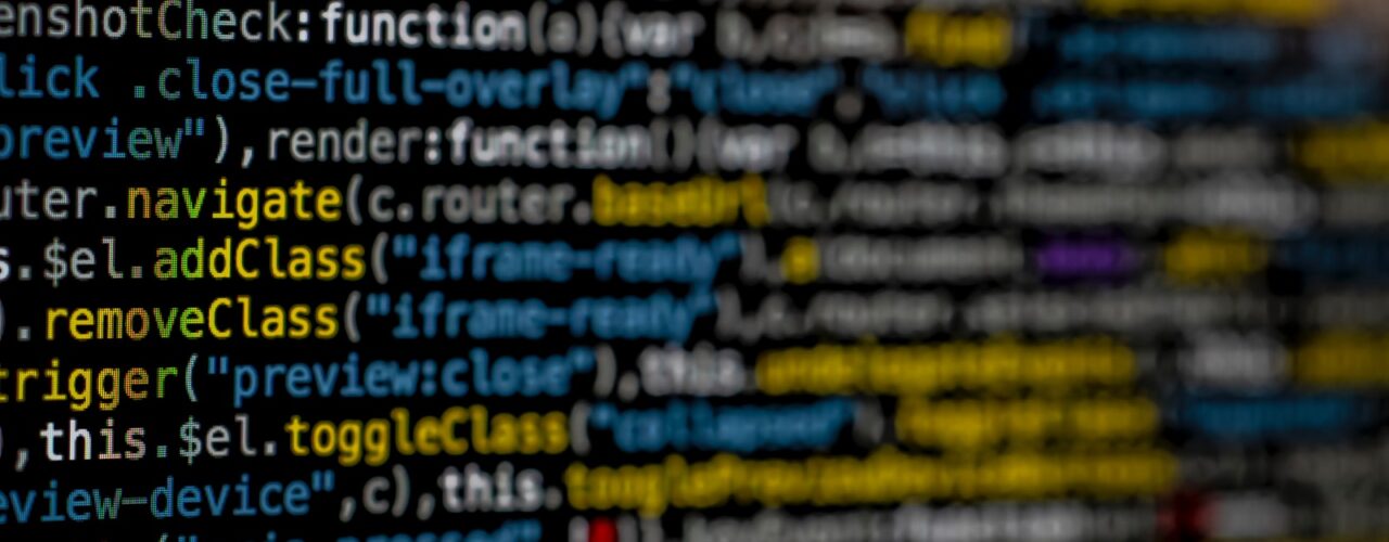 yellow and blue data code displayed on screen