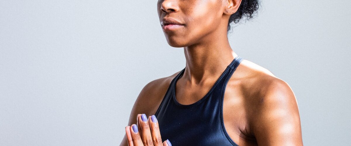 woman wearing black sports bra