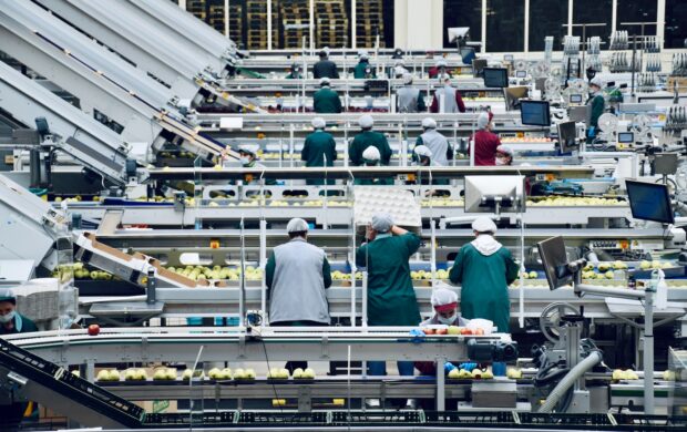 a group of people in a factory