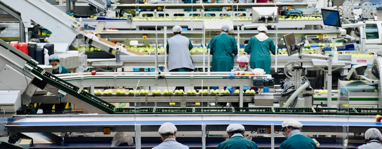 a group of men in a factory