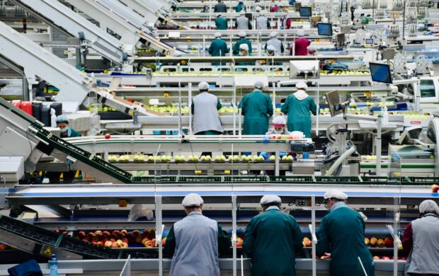 a group of men in a factory